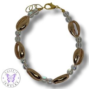 Handmade Gold Wire Bracelet with Cowrie Shell and Crystal Glass Beads